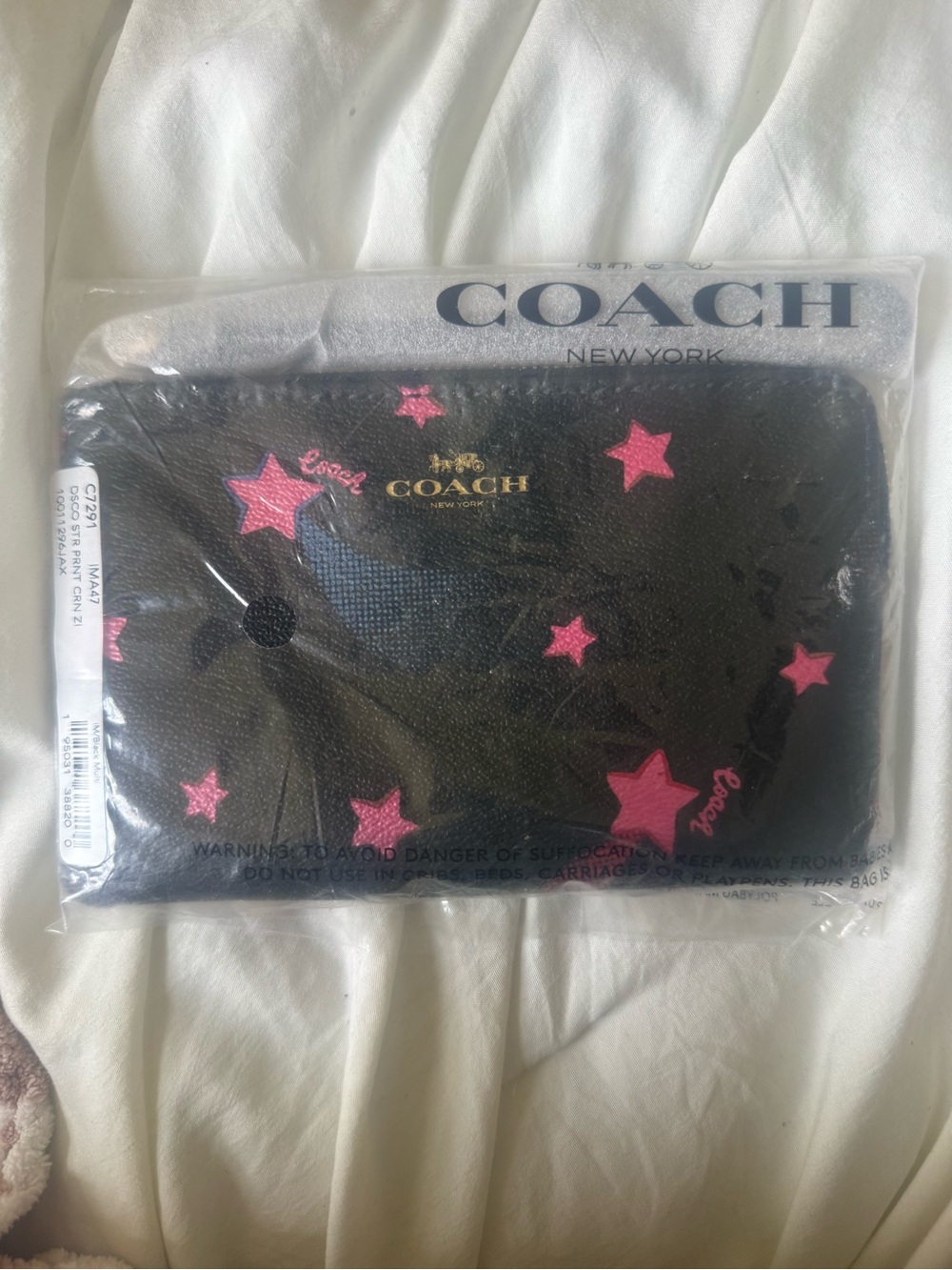 Coach Black Leather Phone Wristlet with Pink Star Print